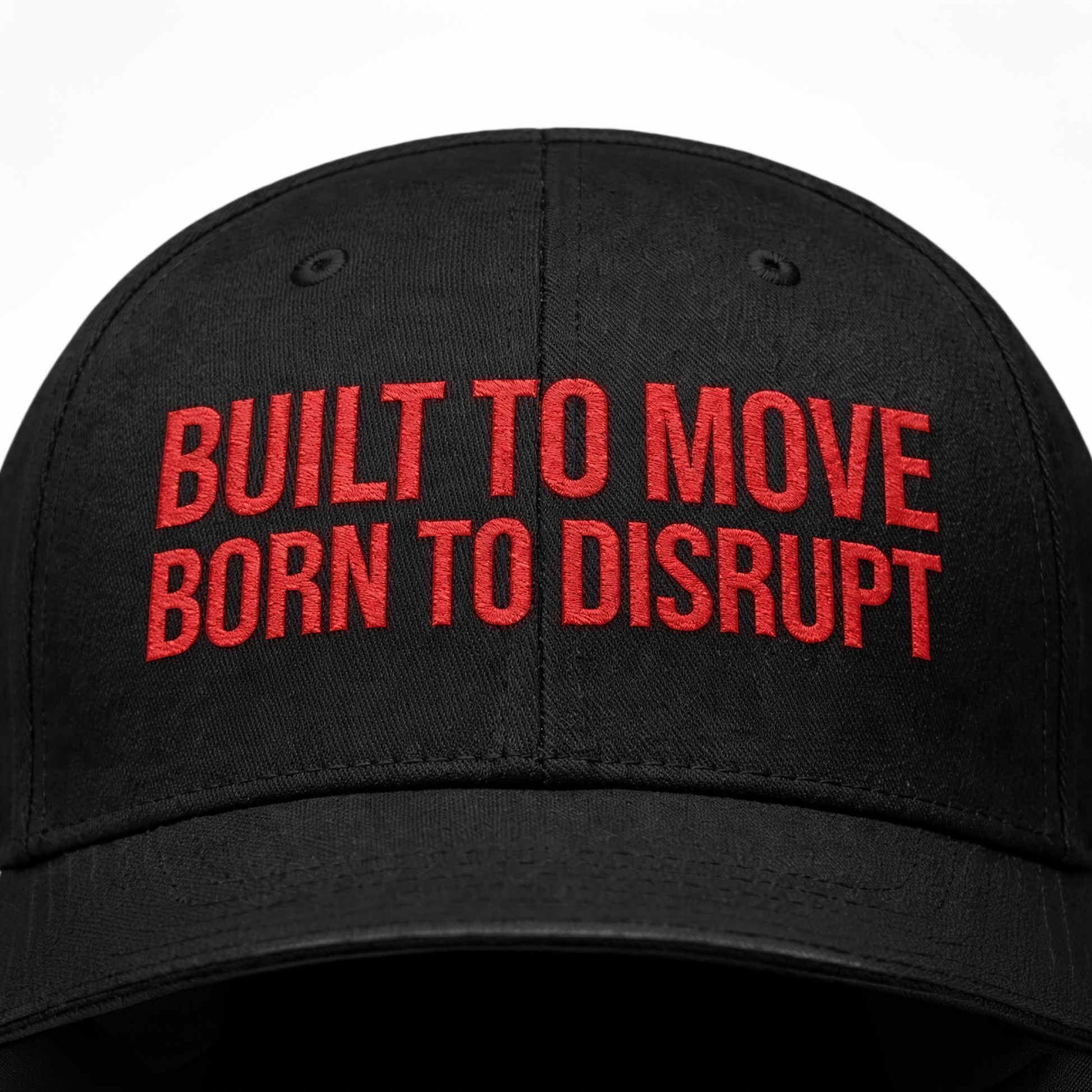 Black cap with red text 'BUILT TO MOVE BORN TO DISRUPT' on a white background
